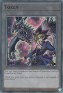 Ficha: Yugi Muto y Gandora-X el Dragón de la Demolición [TKN5-EN001] Súper Rara